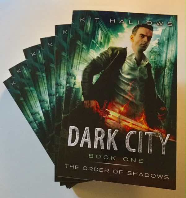 Paperback copies of the Urban Fantasy novel Dark City